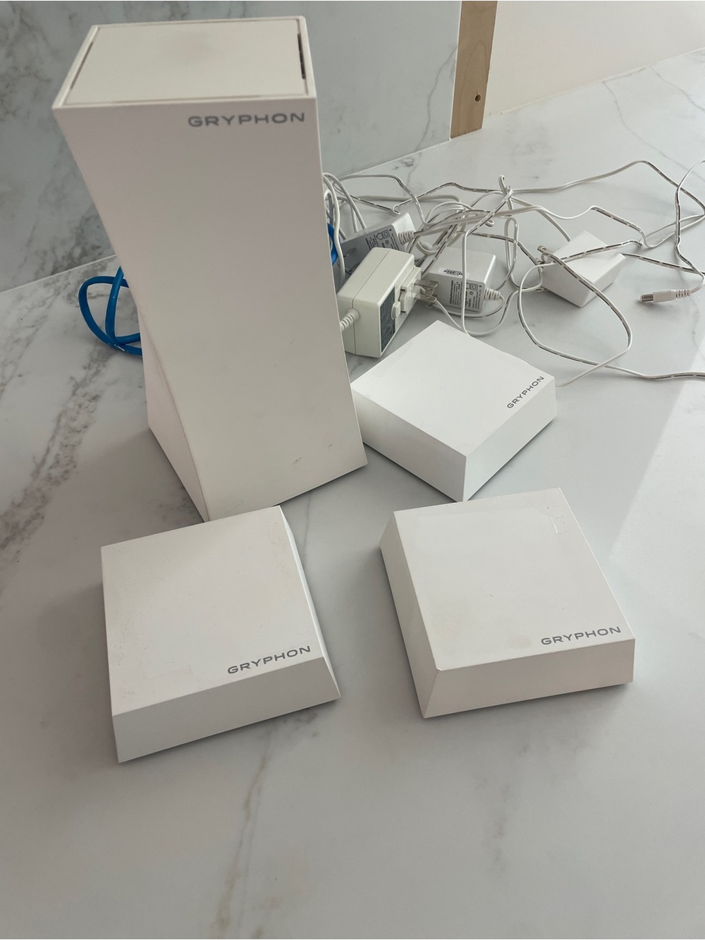 Gryphon Tower Router and 3 Gryphon Guardian mesh repeaters.
